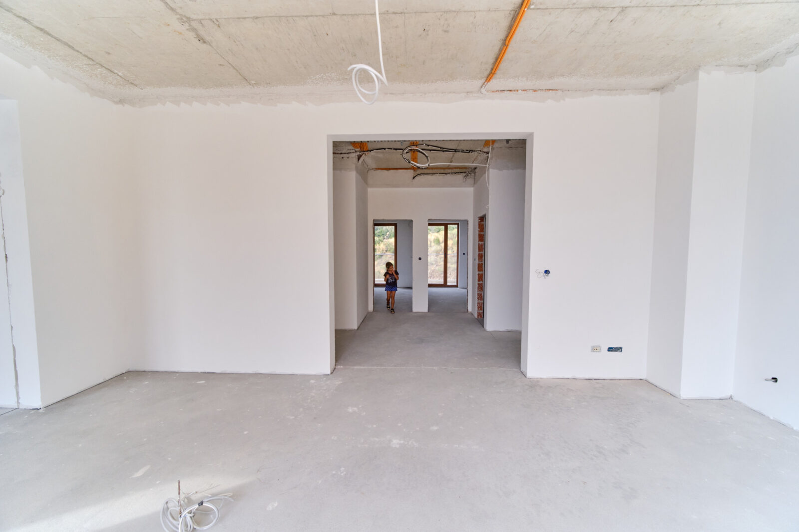 Living room before: a bare developer's shell - ADRIA apartment in RC Belvedere, Bečići