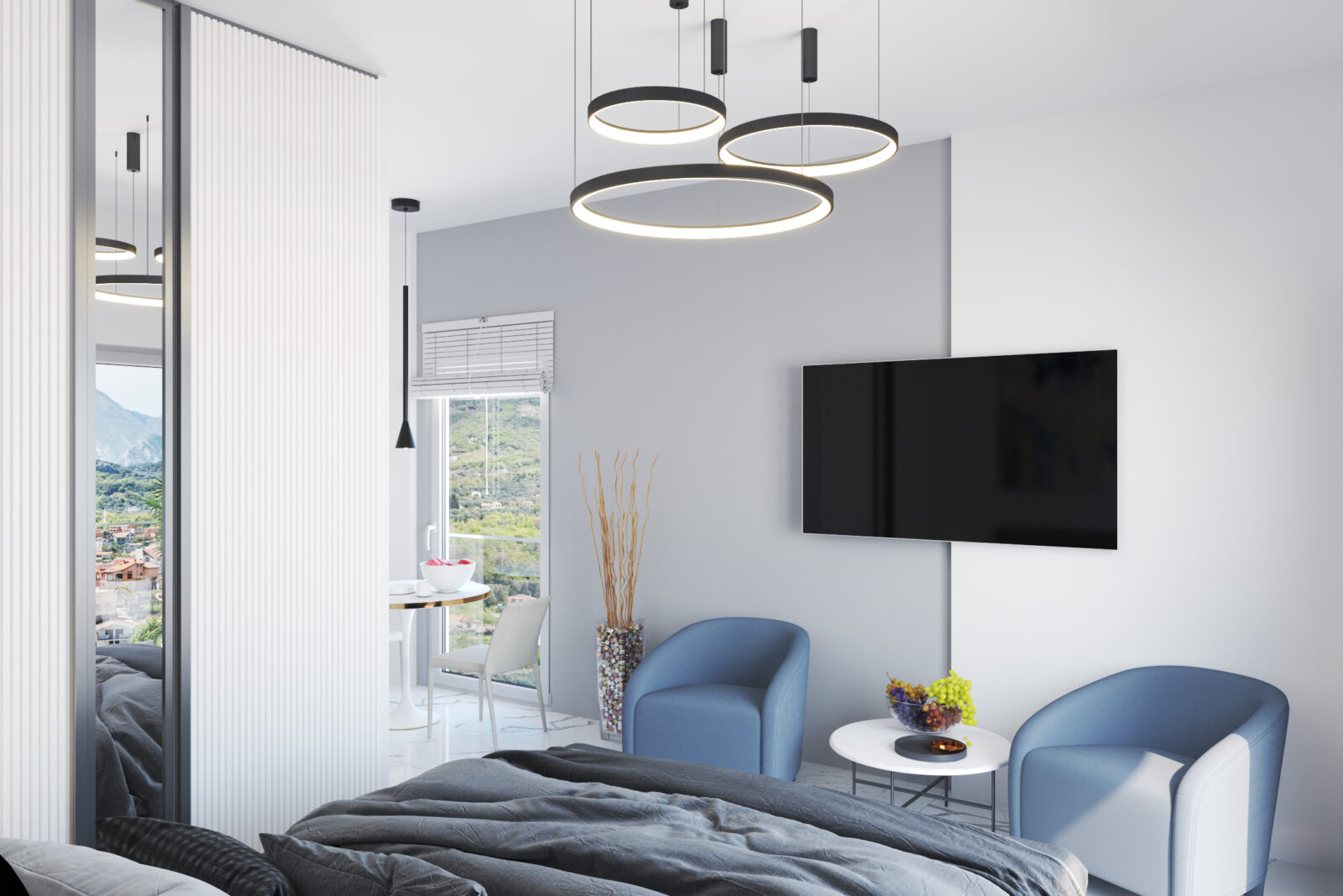 Fotelje, TV i trpezarijski sto pored prozora - apartman br. 25 u Emerald Residence, Bar